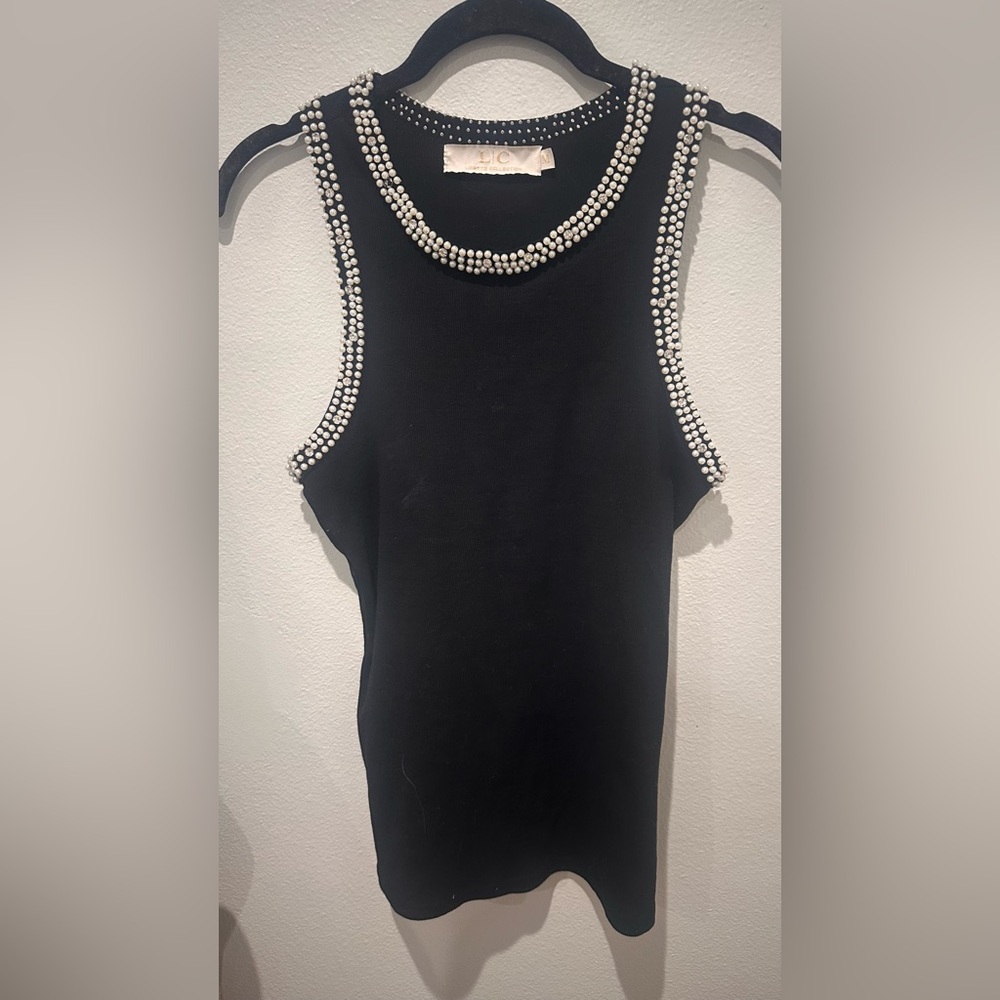 Chic Black Top with Studded Neckline